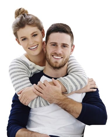 Smiling man and woman after preventive dentistry